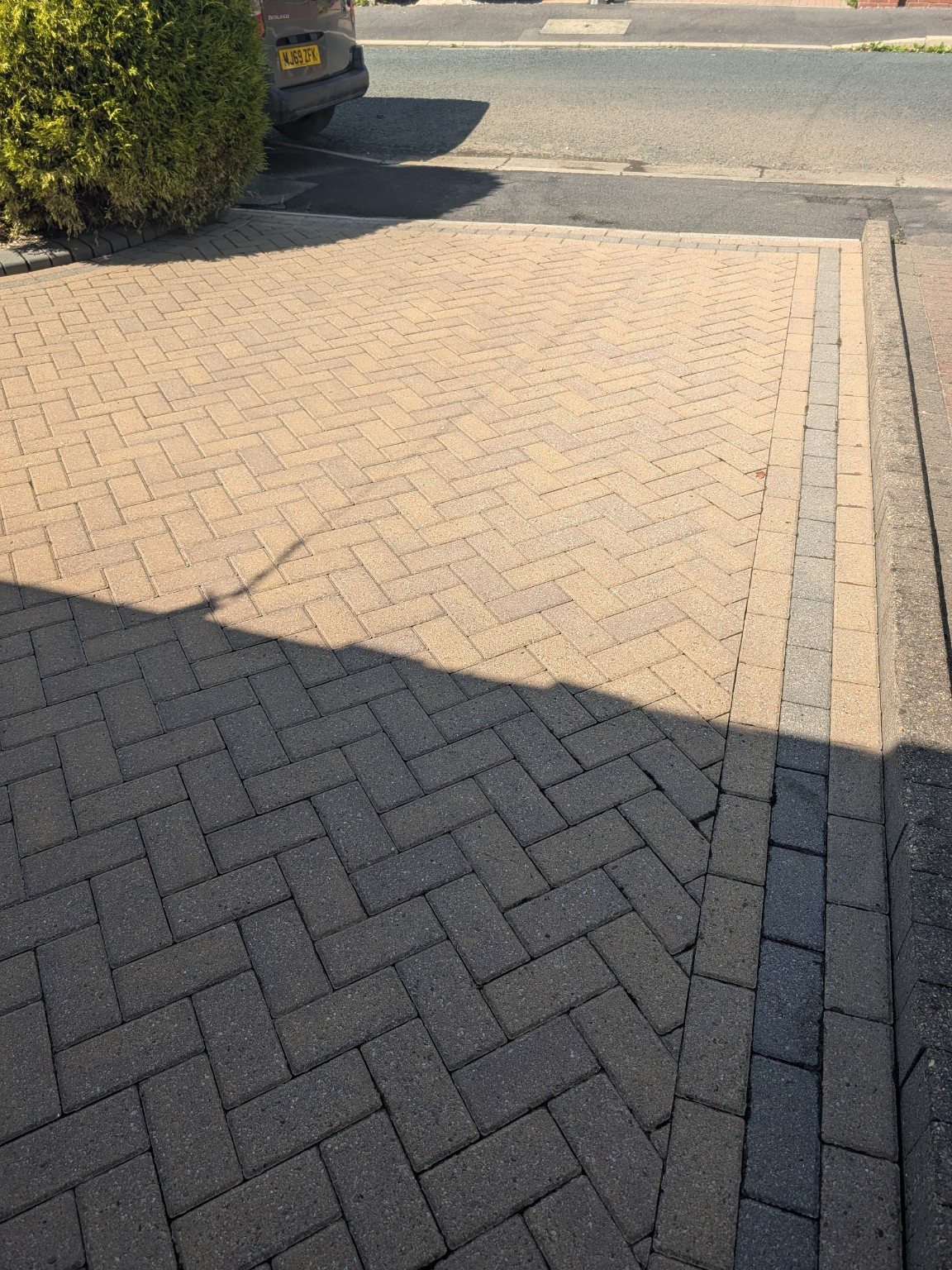 Block paved driveway after cleaning in Oldham